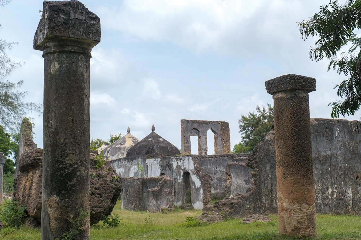 Ancient stone ruins with columns and domed building at Maruhubi Historical Sites, Zanzibar, Tanzania