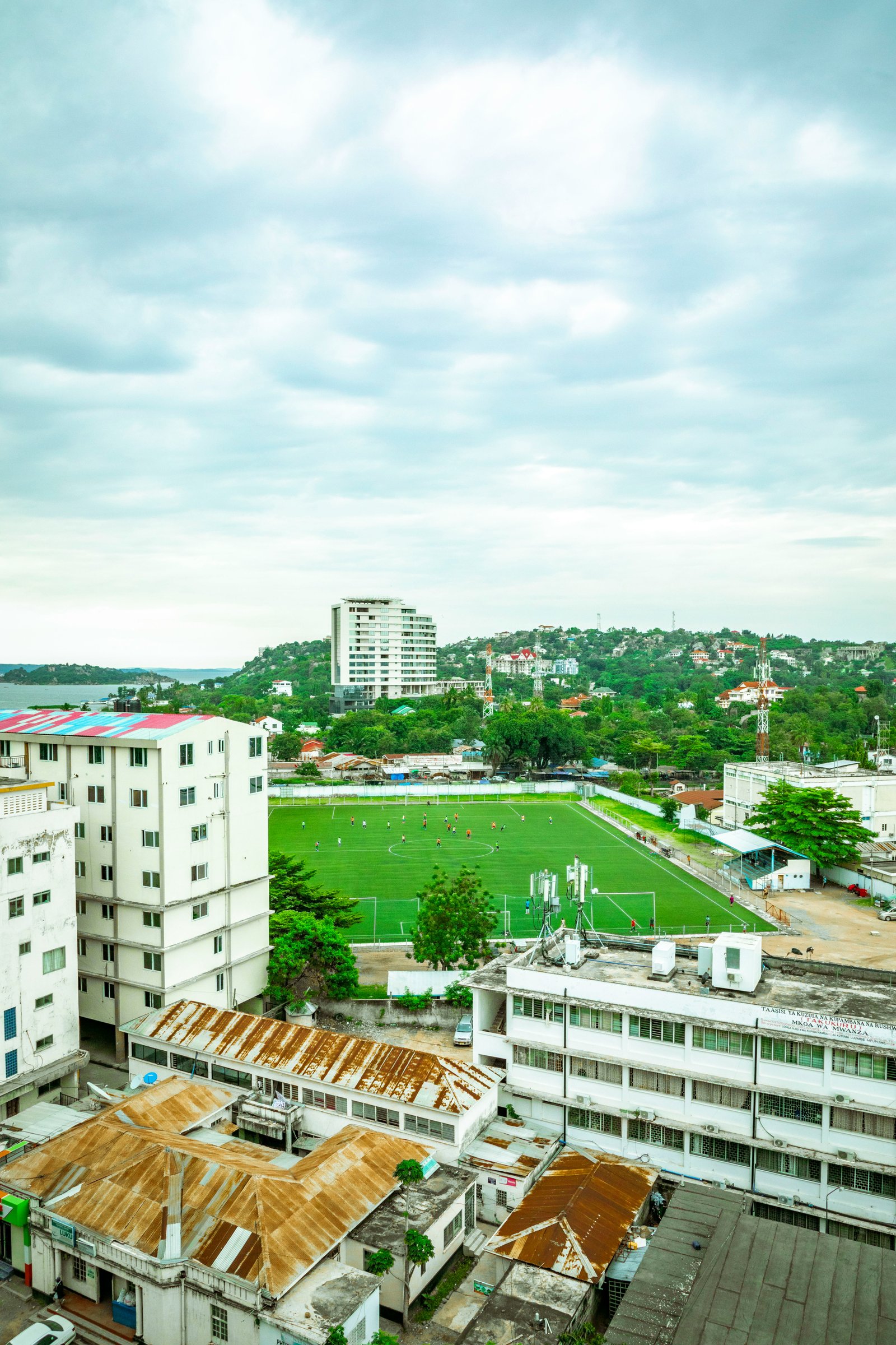 Aerial view of Mwanza city buildings and Lake Victoria shoreline, Tanzania