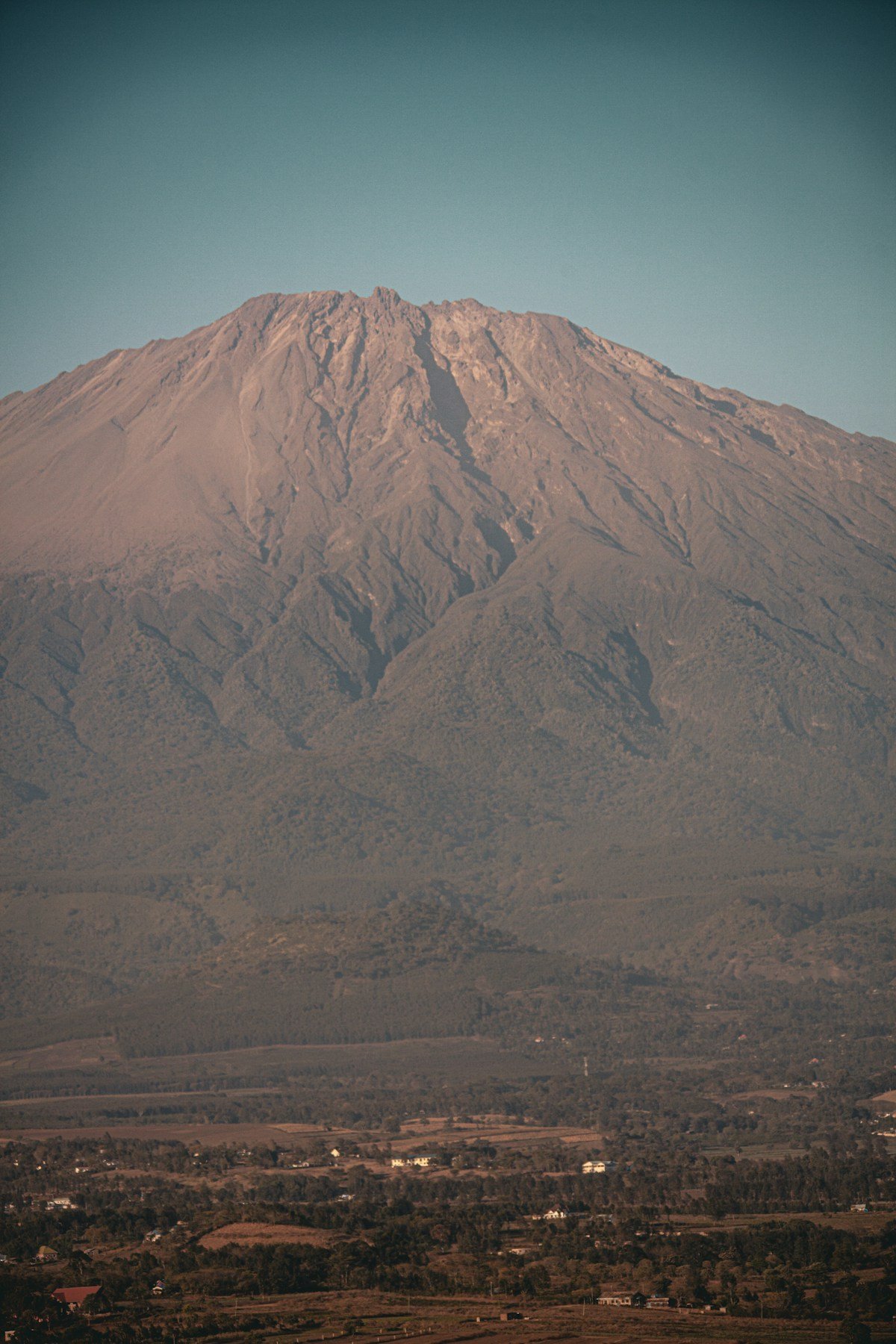 Mount Kilimanjaro rising above the Arusha plains in northern Tanzania